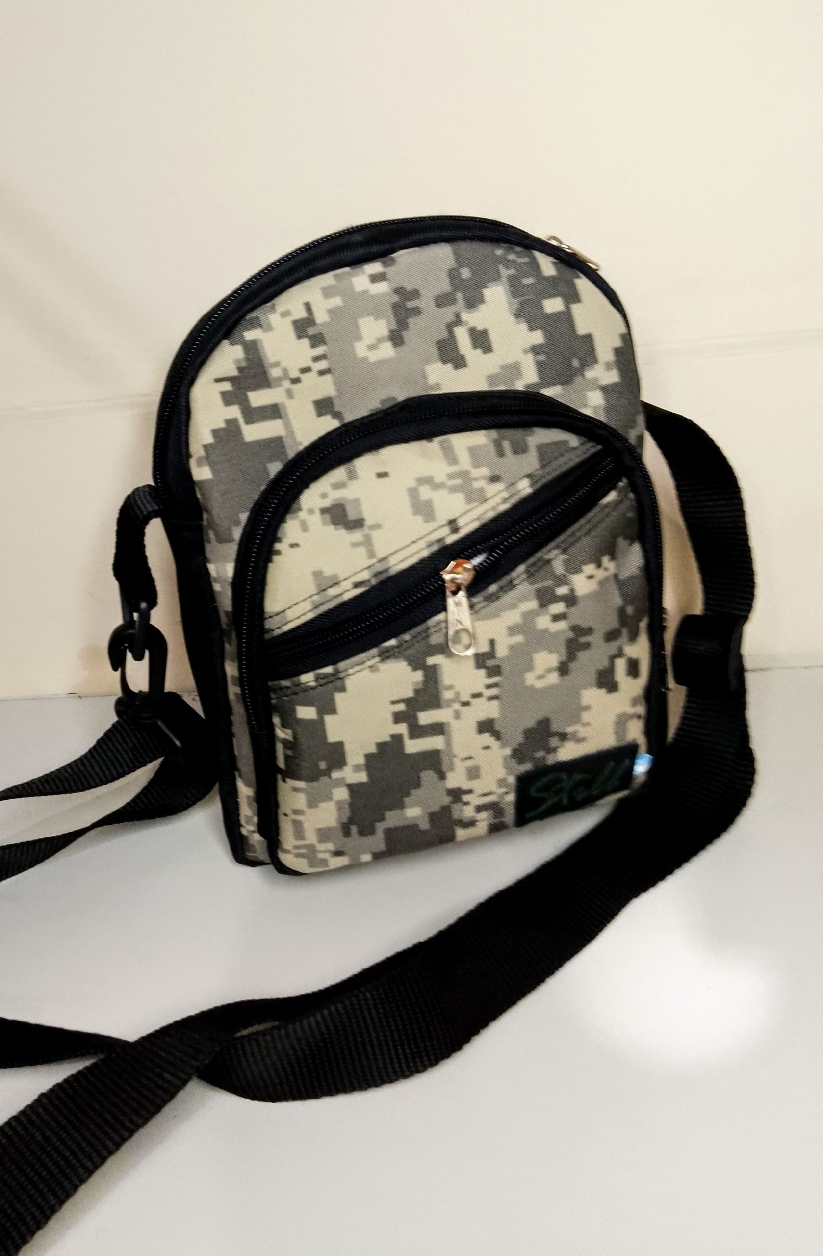 bandolera cámara hombre